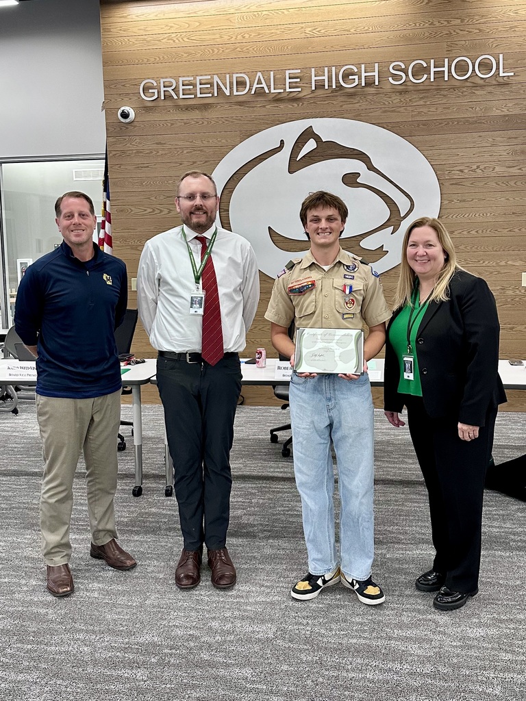 Eagle Scout Cole Nelsen poses with his commendation certificate at the BOE meeting.