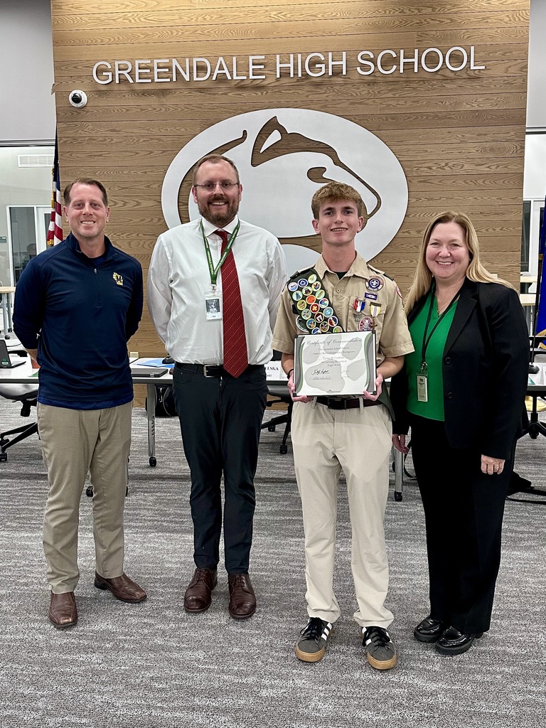 Eagle Scout Tyson McCravens poses with this commendation certificate at the BOE meeting.