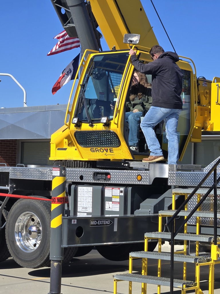 Sabrina in crane at Trade Expo