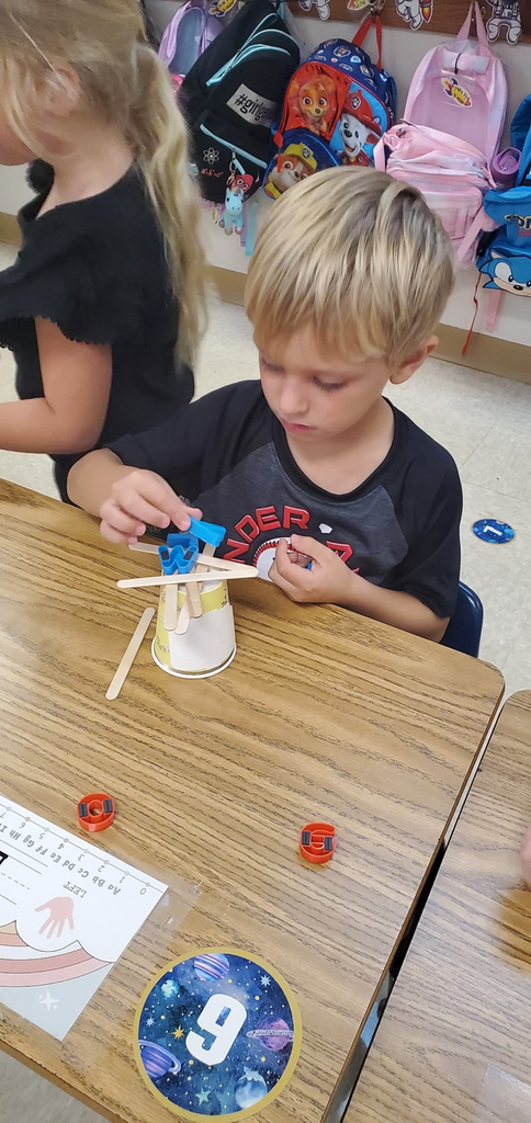 Mrs. Melissa's class having some fun with our ABC Bootcamp today: Chicka Chicka Boom Boom! We built our own letter coconut trees!