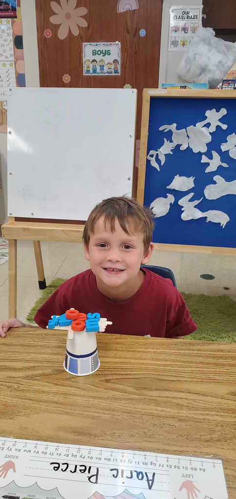 Mrs. Melissa's class having some fun with our ABC Bootcamp today: Chicka Chicka Boom Boom! We built our own letter coconut trees!