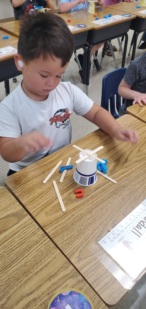 Mrs. Melissa's class having some fun with our ABC Bootcamp today: Chicka Chicka Boom Boom! We built our own letter coconut trees!