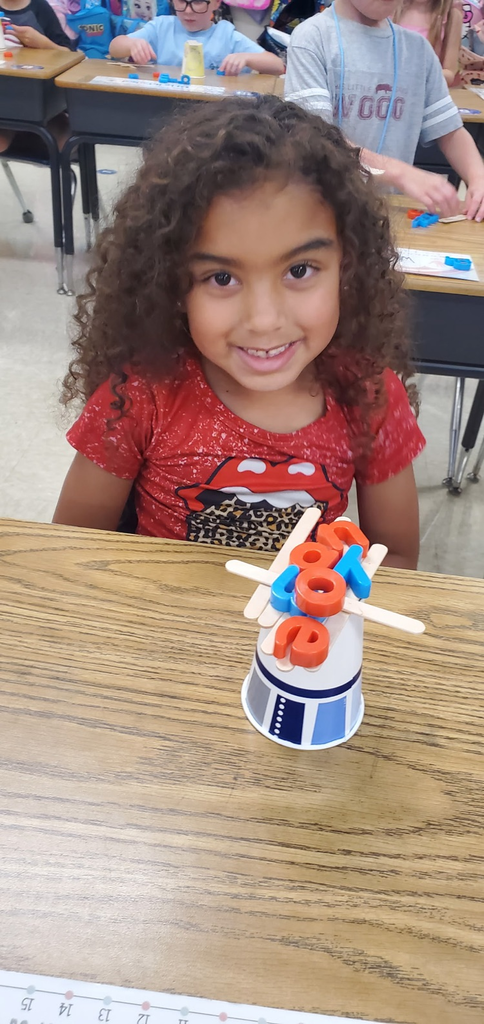 Mrs. Melissa's class having some fun with our ABC Bootcamp today: Chicka Chicka Boom Boom! We built our own letter coconut trees!