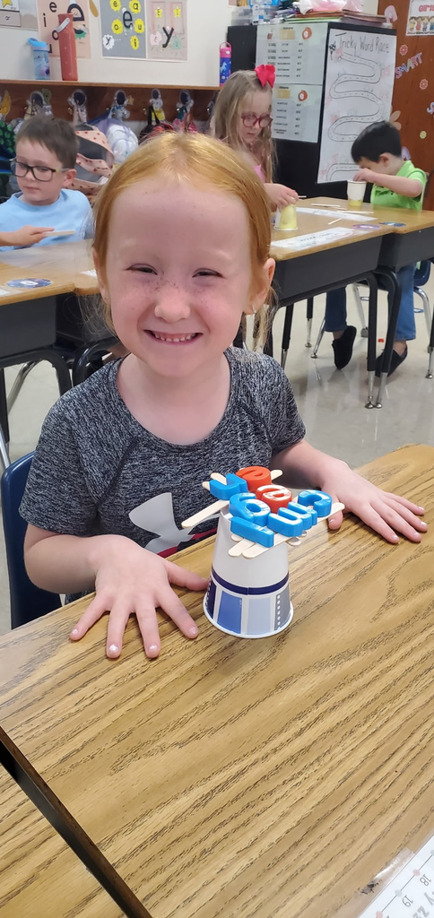 Mrs. Melissa's class having some fun with our ABC Bootcamp today: Chicka Chicka Boom Boom! We built our own letter coconut trees!