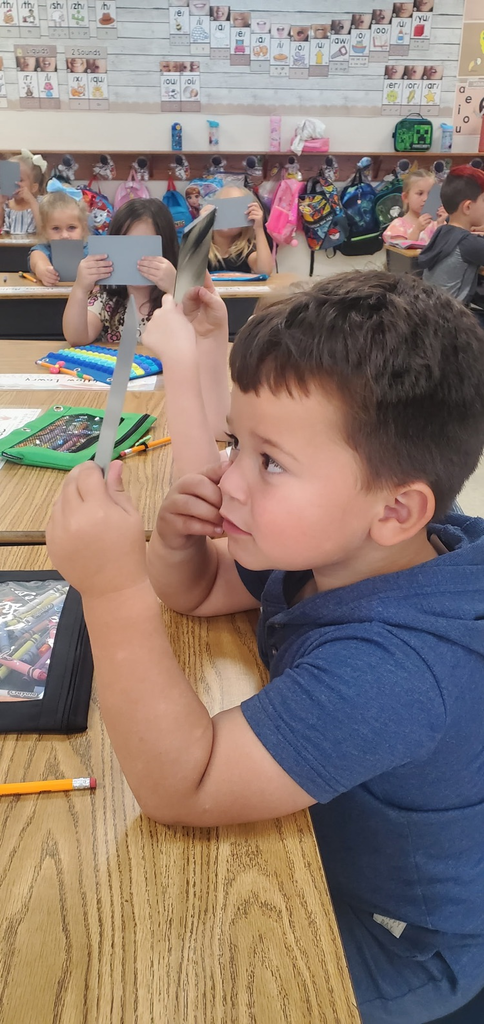 Mrs. Melissa's class is the beginning writing phase which includes learning to draw. Today we looked at our facial features and drew self portraits!