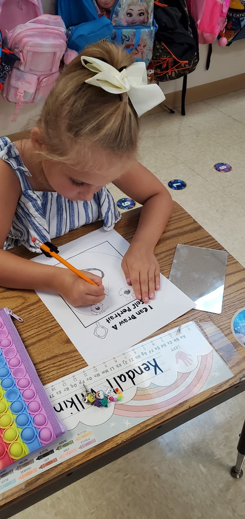 Mrs. Melissa's class is the beginning writing phase which includes learning to draw. Today we looked at our facial features and drew self portraits!