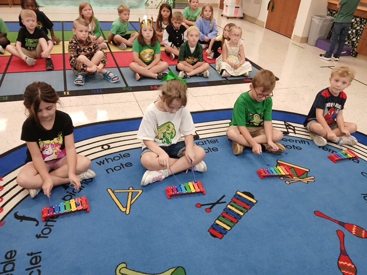 Mrs. McMillons class adding an accompaniment to the Folk Song, Naughty Kitty Cat.