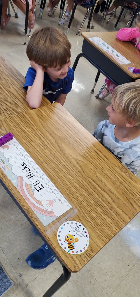 Mrs. Melissa's class having fun with learning. In math, we worked on subitizing and writing numbers by taking each other's order for tacos, apples, and pretzels.