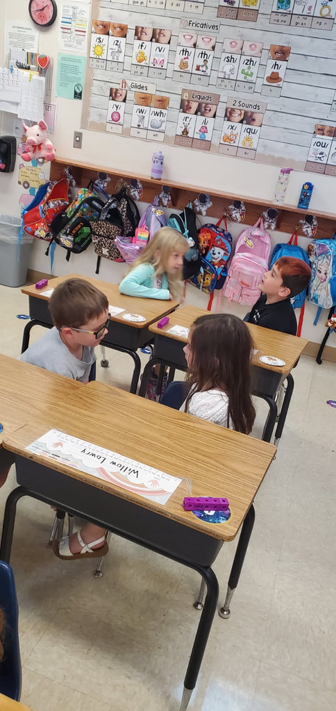 Mrs. Melissa's class having fun with learning. In math, we worked on subitizing and writing numbers by taking each other's order for tacos, apples, and pretzels.