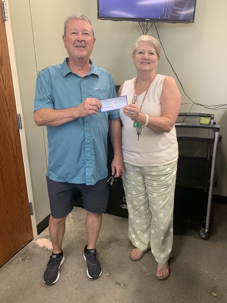 Mr. Keith Bryson - Sonic (longtime supporter) making a monetary donation to GCT Parent Center to help serve student’s needs.