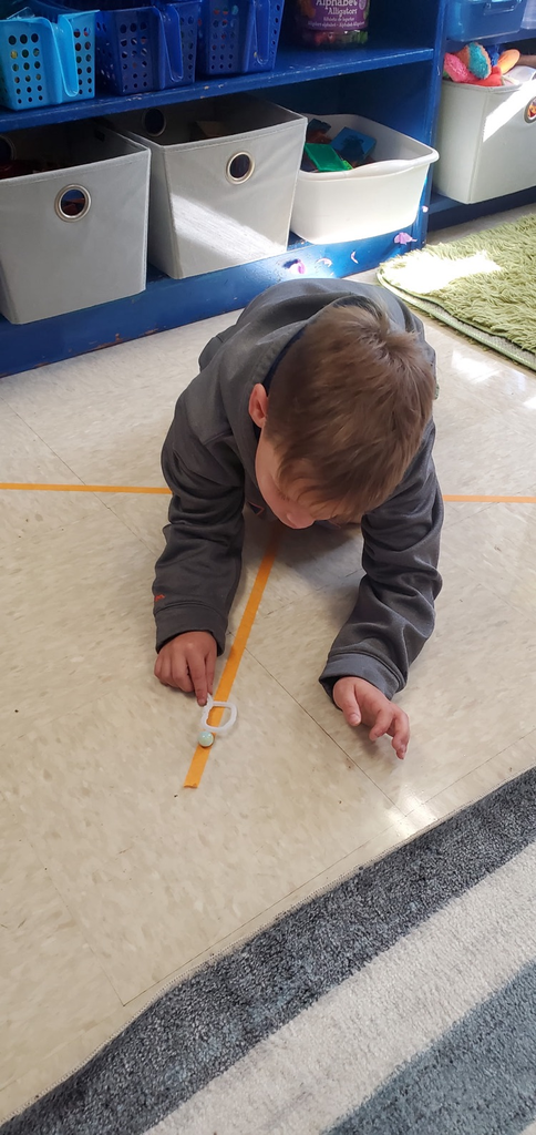 Mrs. Melissa's class learning about lines which leads us to writing: Took our snails for a walk today on spirals, zigzag, vertical, horizontal, diagonal, wavy and ×/+ lines too!!