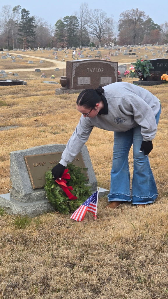 placing flag and wreath 