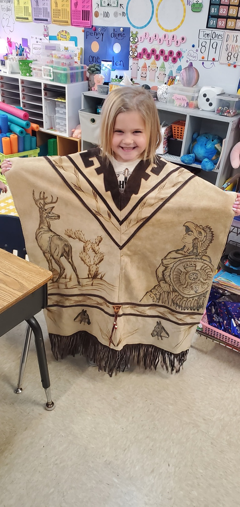 Mrs. Miller's class is working their way through the Knowledge Unit about Native Americans.  We got to see and touch some of the items Native Americans would have made, used, and wore.