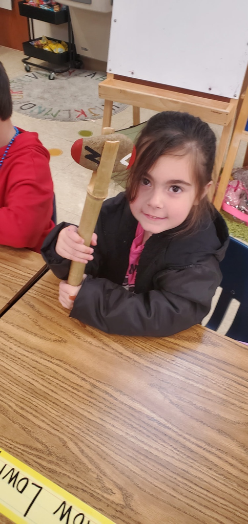 Mrs. Miller's class is working their way through the Knowledge Unit about Native Americans.  We got to see and touch some of the items Native Americans would have made, used, and wore.