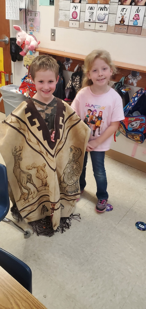 Mrs. Miller's class is working their way through the Knowledge Unit about Native Americans.  We got to see and touch some of the items Native Americans would have made, used, and wore.