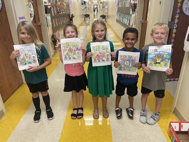 “Ms. Erin’s class had a coloring contest today to support our football boys tonight! Go Eagles💚💛”