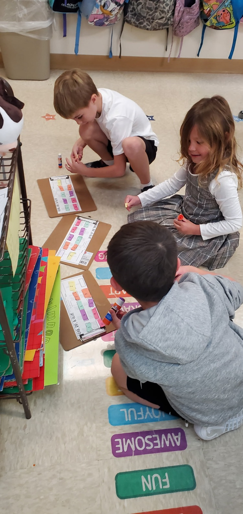 Mrs. Melissa's class had fun in Math: Counting and Identifying numbers with Bone Tally Marks in Grab, Rip, & Glue!