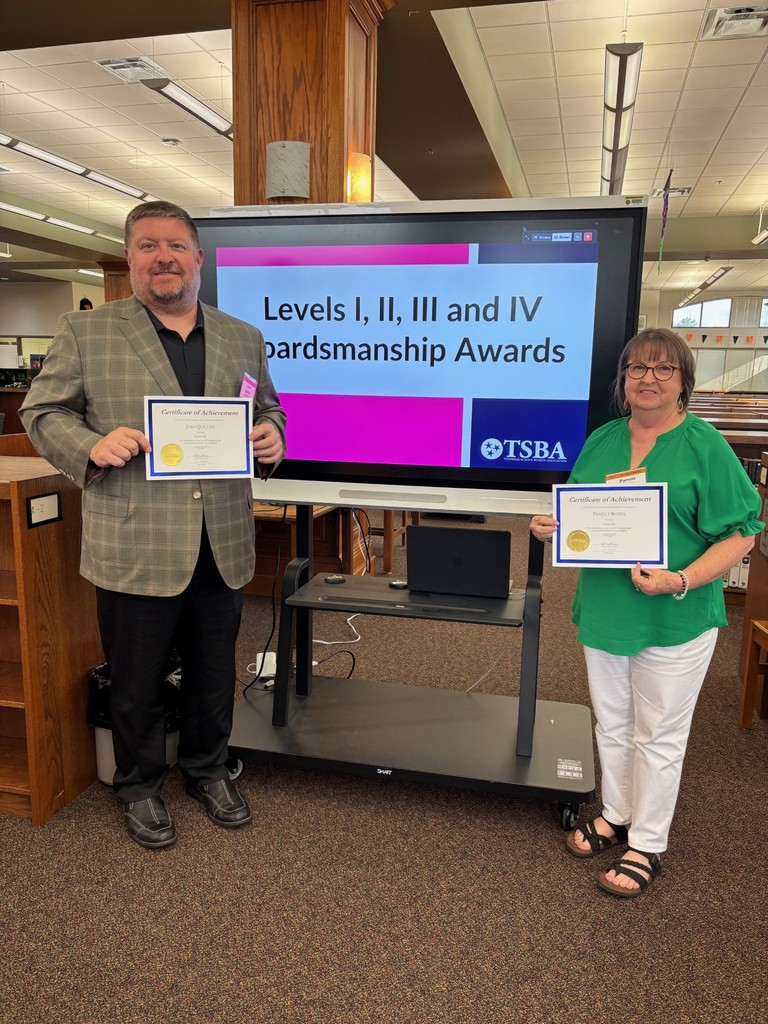 Josh Quillen and Pam Botta receive level IV Boardmanship