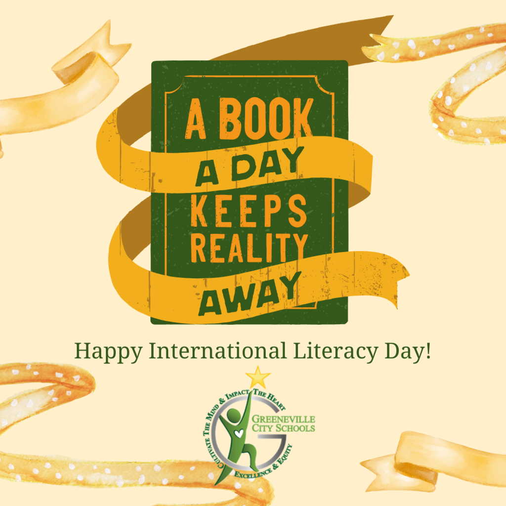 Illustration of a green book with a yellow ribbon and the phrase 'A BOOK A DAY KEEPS REALITY AWAY.' Below it, the text reads 'Happy International Literacy Day!' with the Greeneville City Schools logo and motto:.