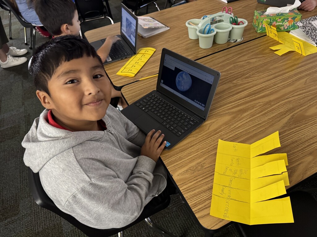 student using computer for map activity