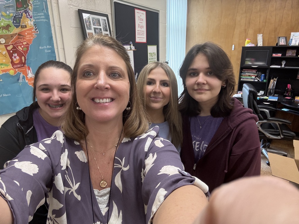 a picture of a teacher and students
