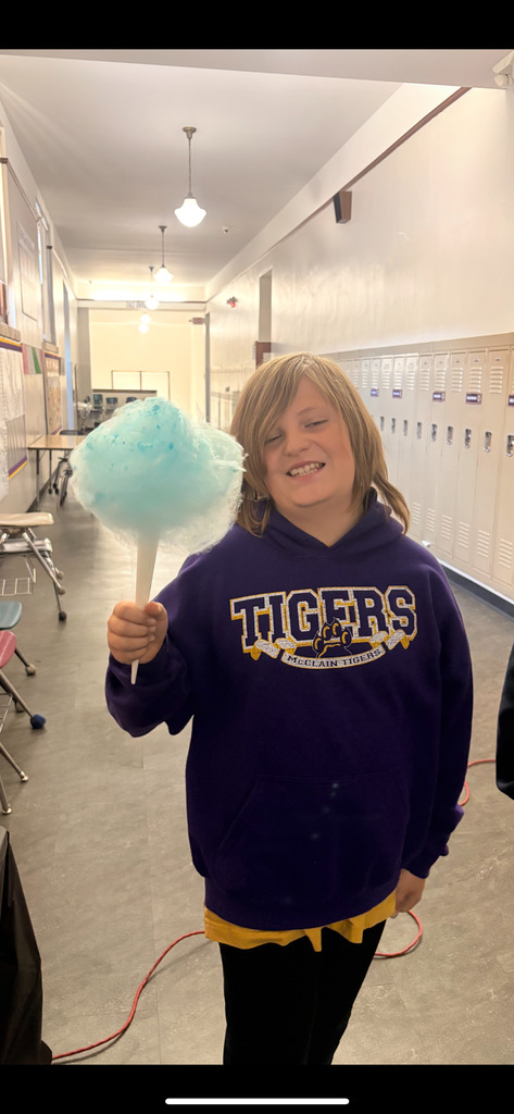student with cotton candy