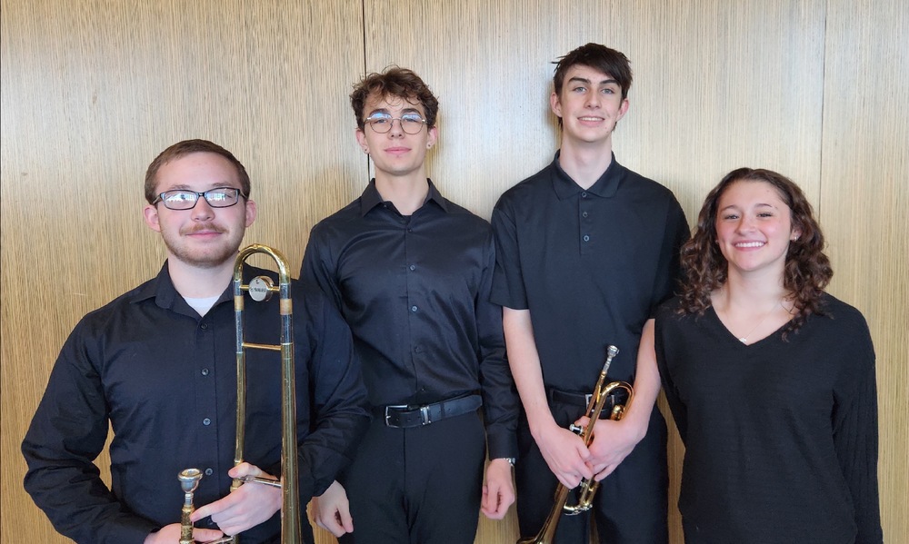 Image of Greenfield Band students, Hunter Hensley, Caleb Strieter, Seth Bullinger, and Ezabella Vesco