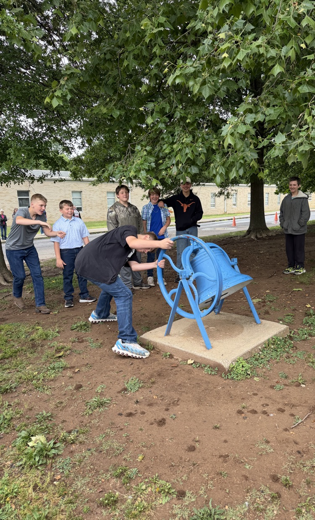 student rings the bell