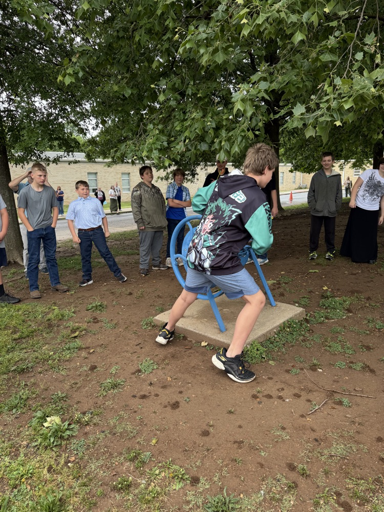 student rings the bell