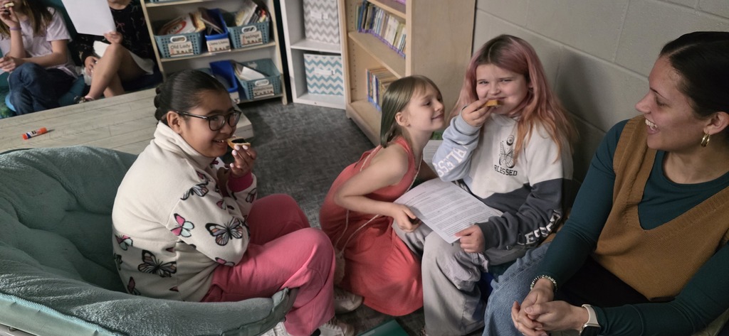 student trying molasses and tea