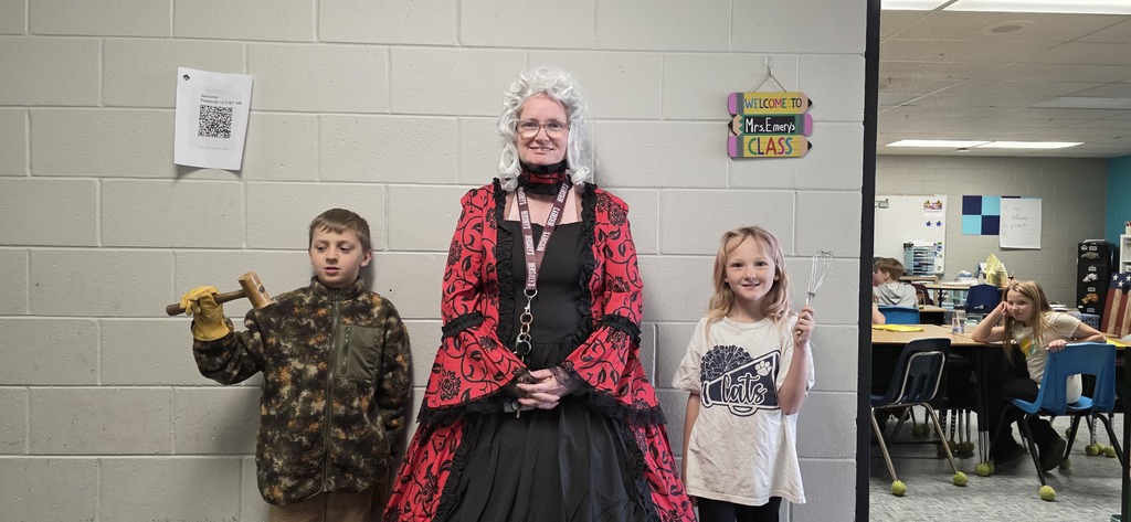 student trying molasses and tea