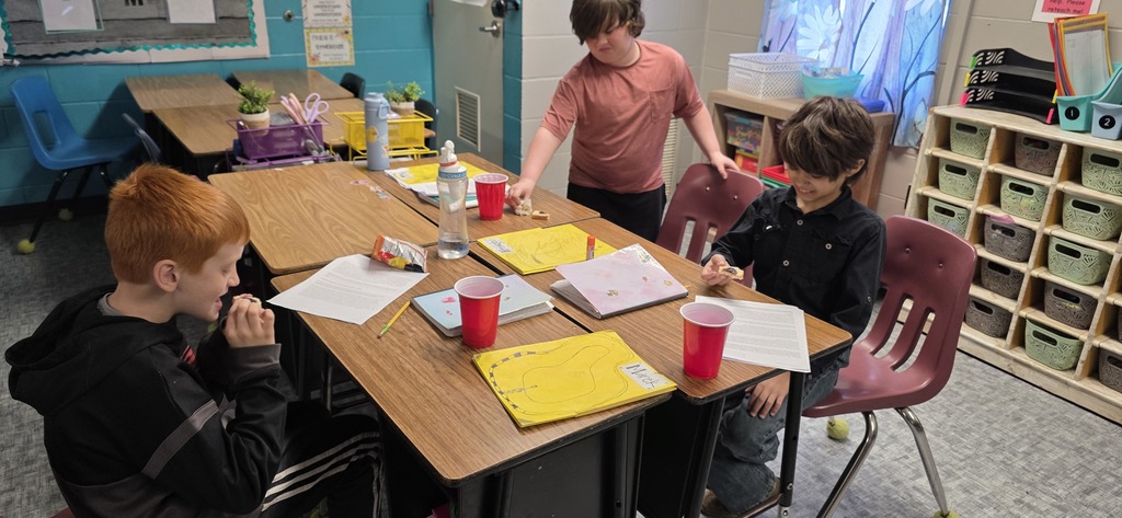 student trying molasses and tea
