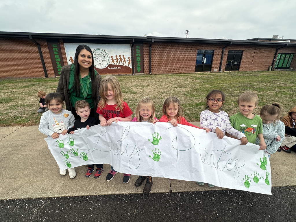 GES holding Lady Pirate sign for send-off