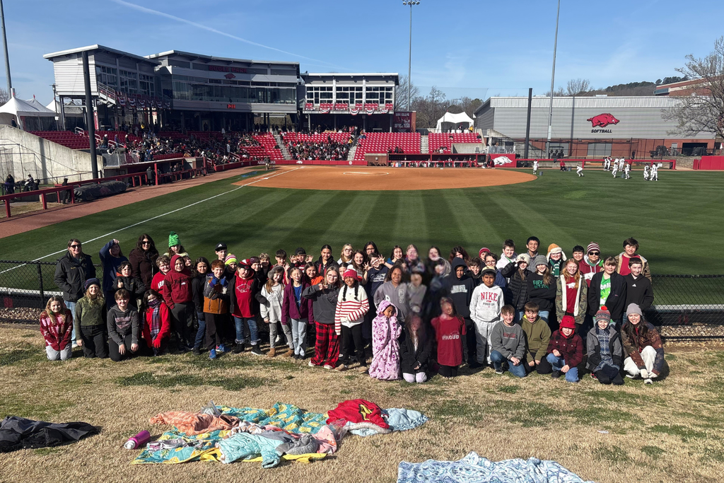 group photo at the lady razorback softball game