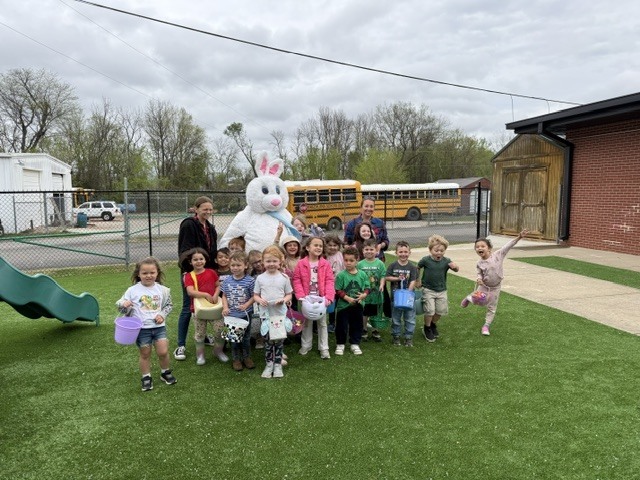 students hunting easter eggs