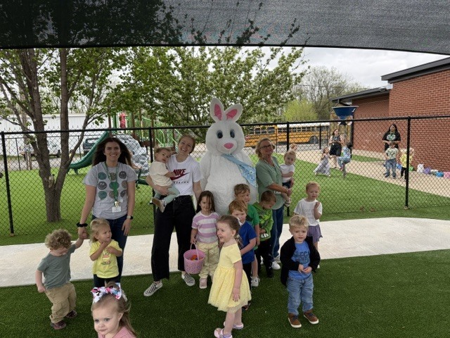 students hunting easter eggs