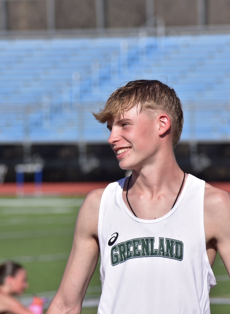 Athlete with greenland track shirt