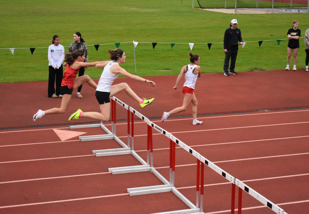 Runners hurdling