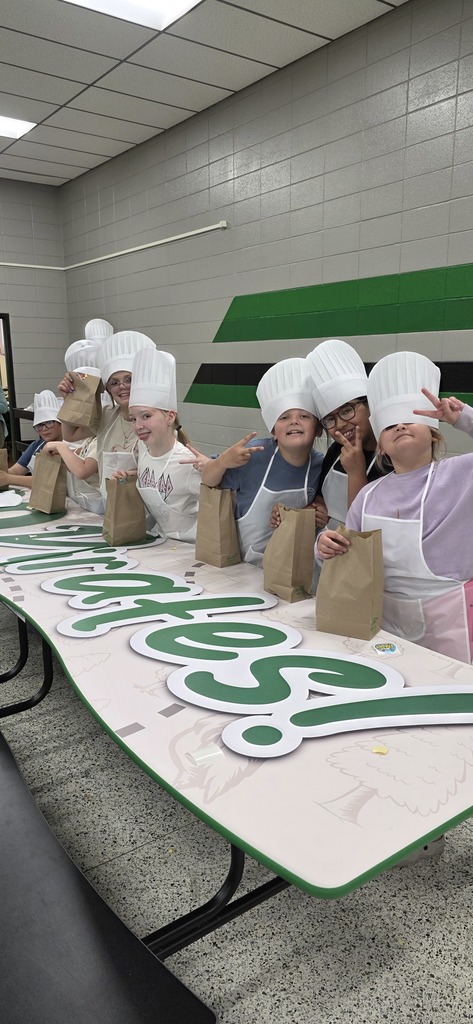 students putting food in a bag