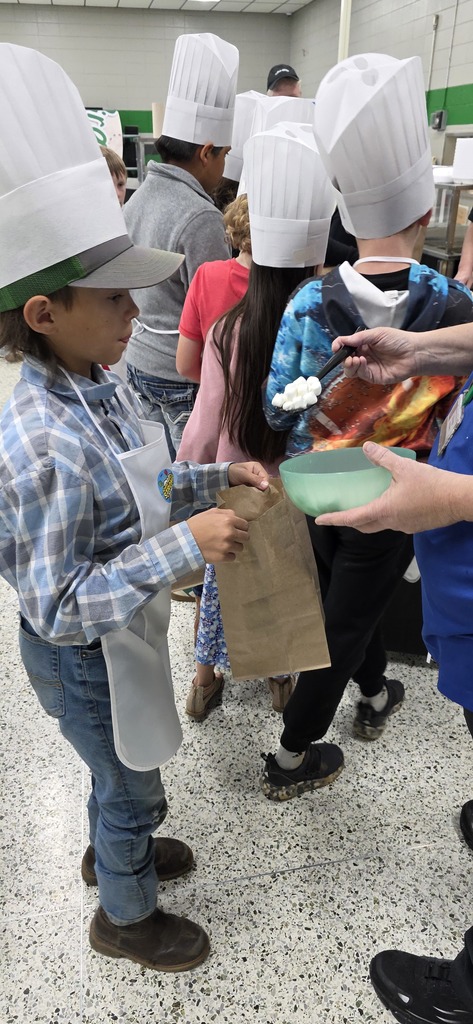 students putting food in a bag