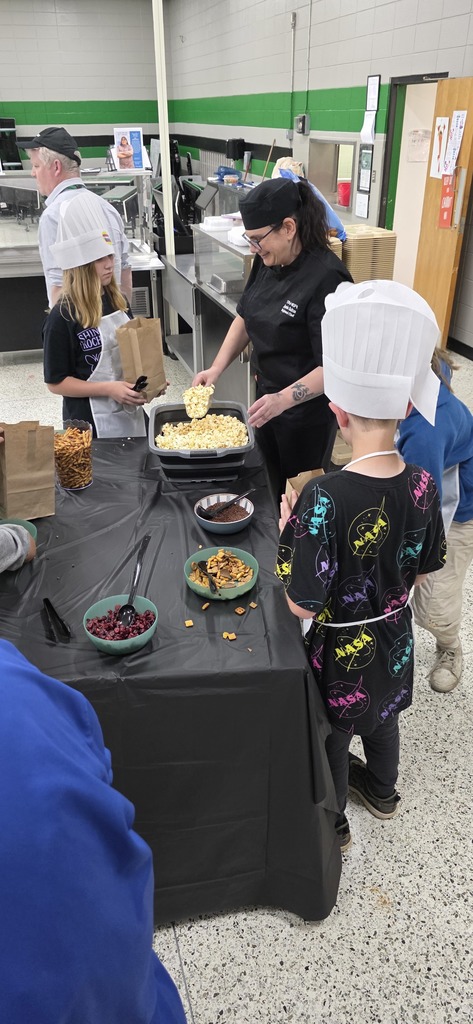 students putting food in a bag