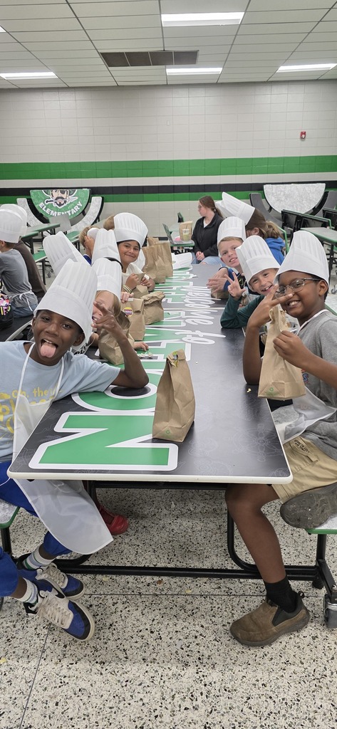students putting food in a bag