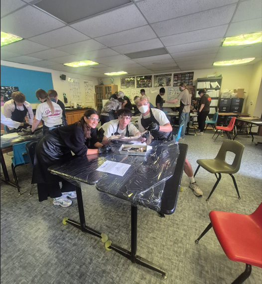students dissecting a shark