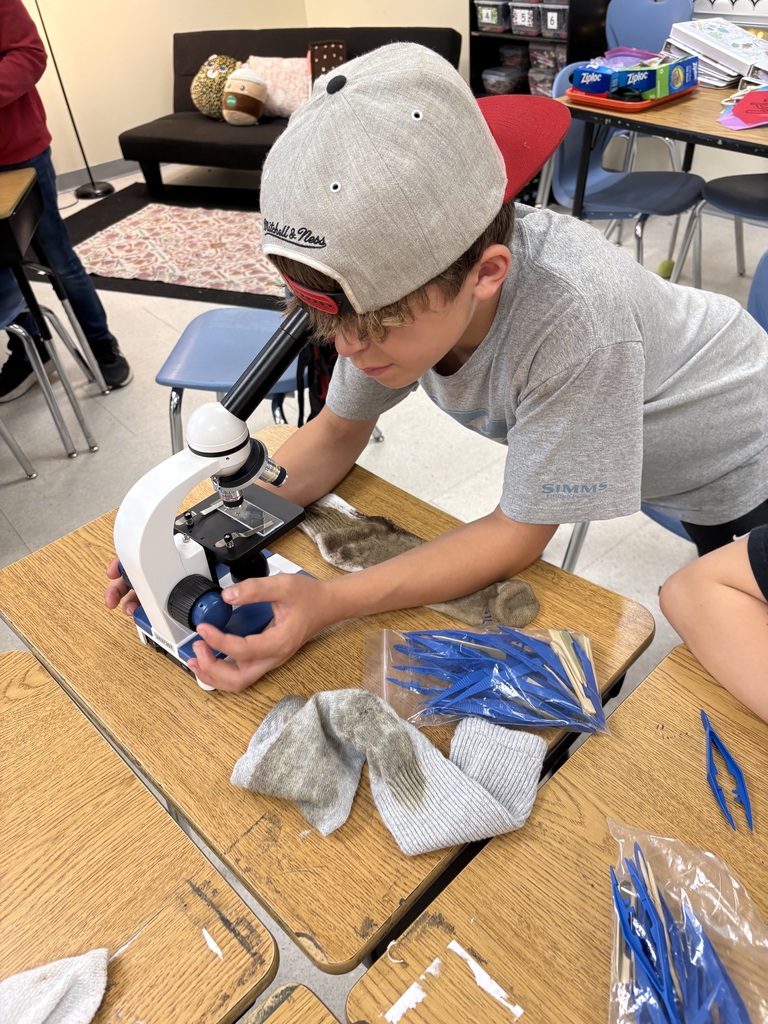 student with telescope