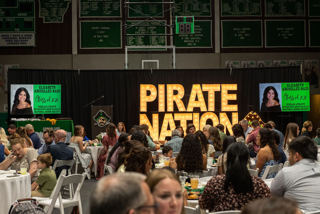 Hall of Honor Banquet, attendees and pirate nation light up sign