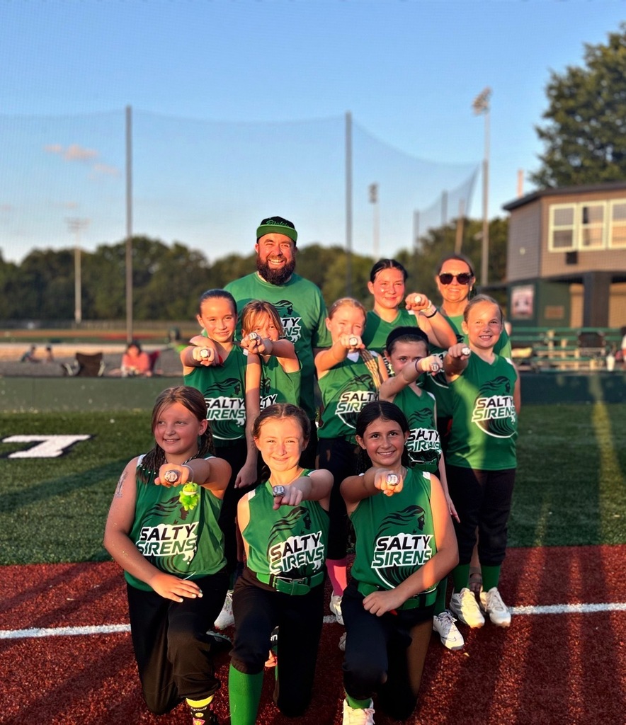 softball team celebrating