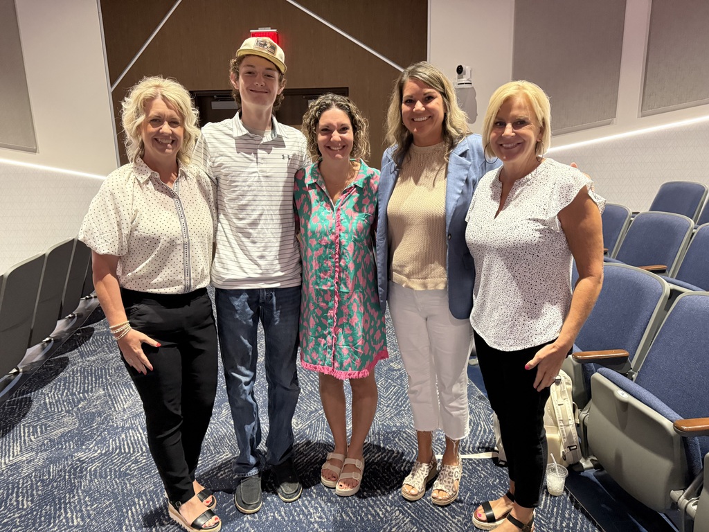 5 people standing together