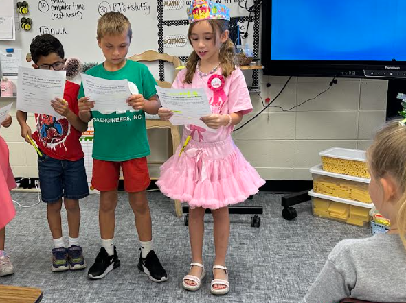 students standing reading