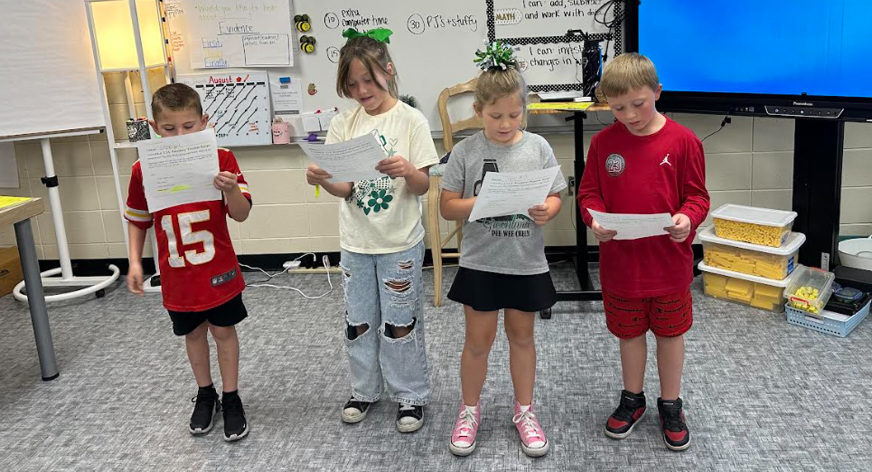 students standing reading