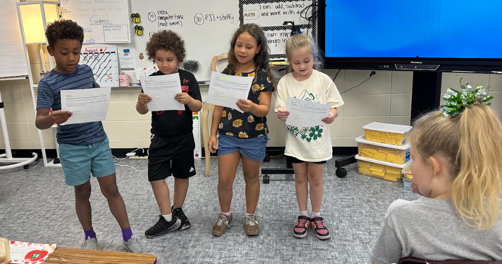 students standing reading
